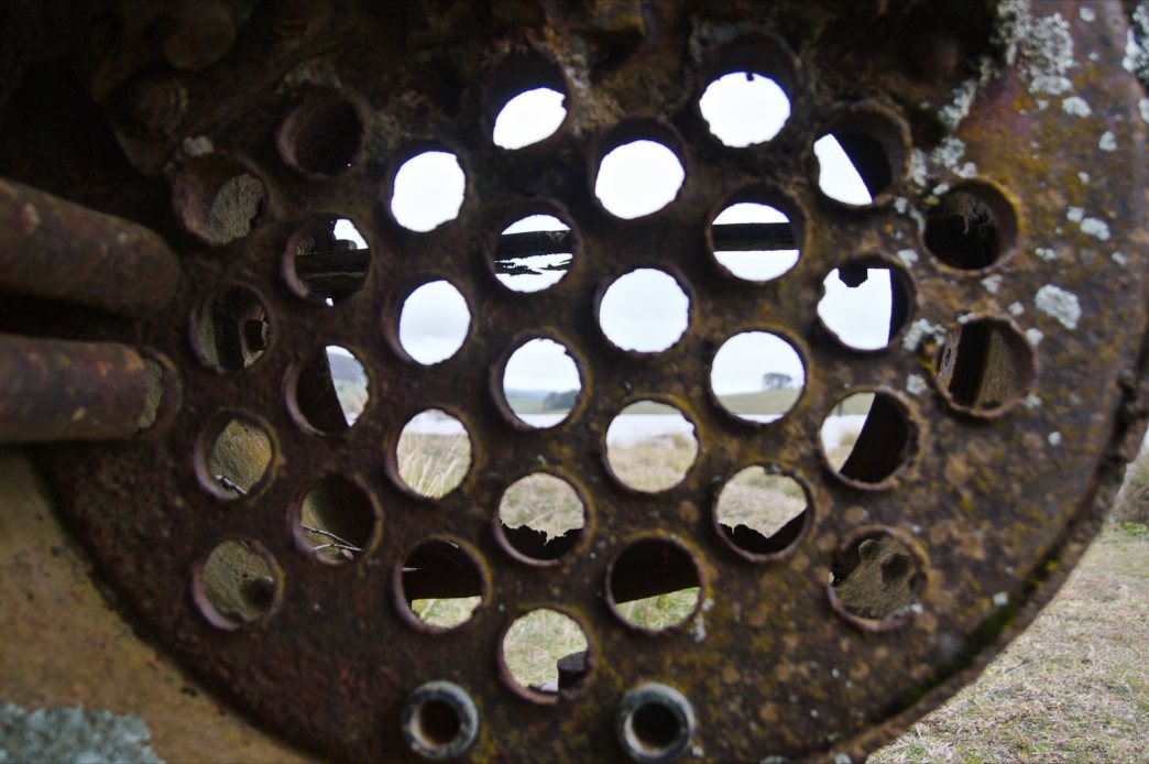 Heat-exchanger tube sheet showing the tube ends and the surrounding tube plate